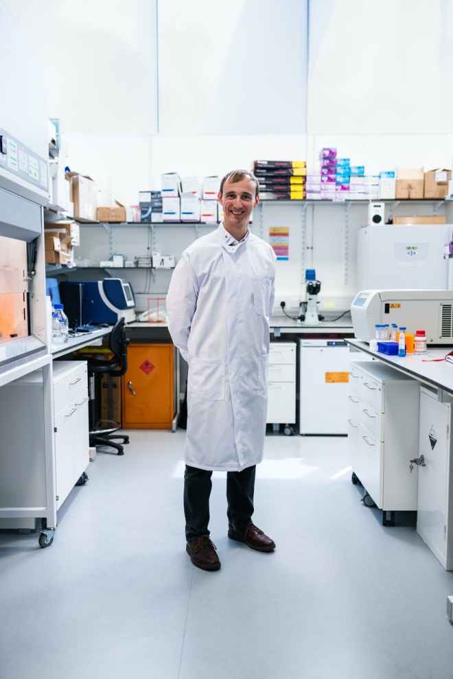 scientist standing in laboratory